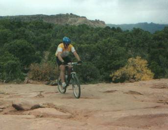Gary slams up the rock ledges towards the top of Porcupine